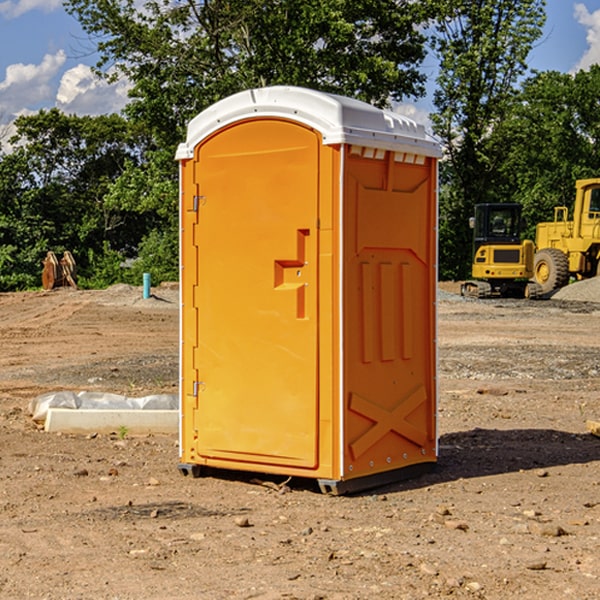 how often are the porta potties cleaned and serviced during a rental period in Dodson